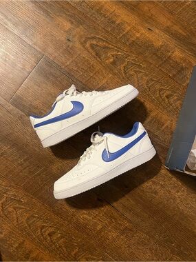 Nike White Low-Top Sneakers with Royal Blue Swoosh
